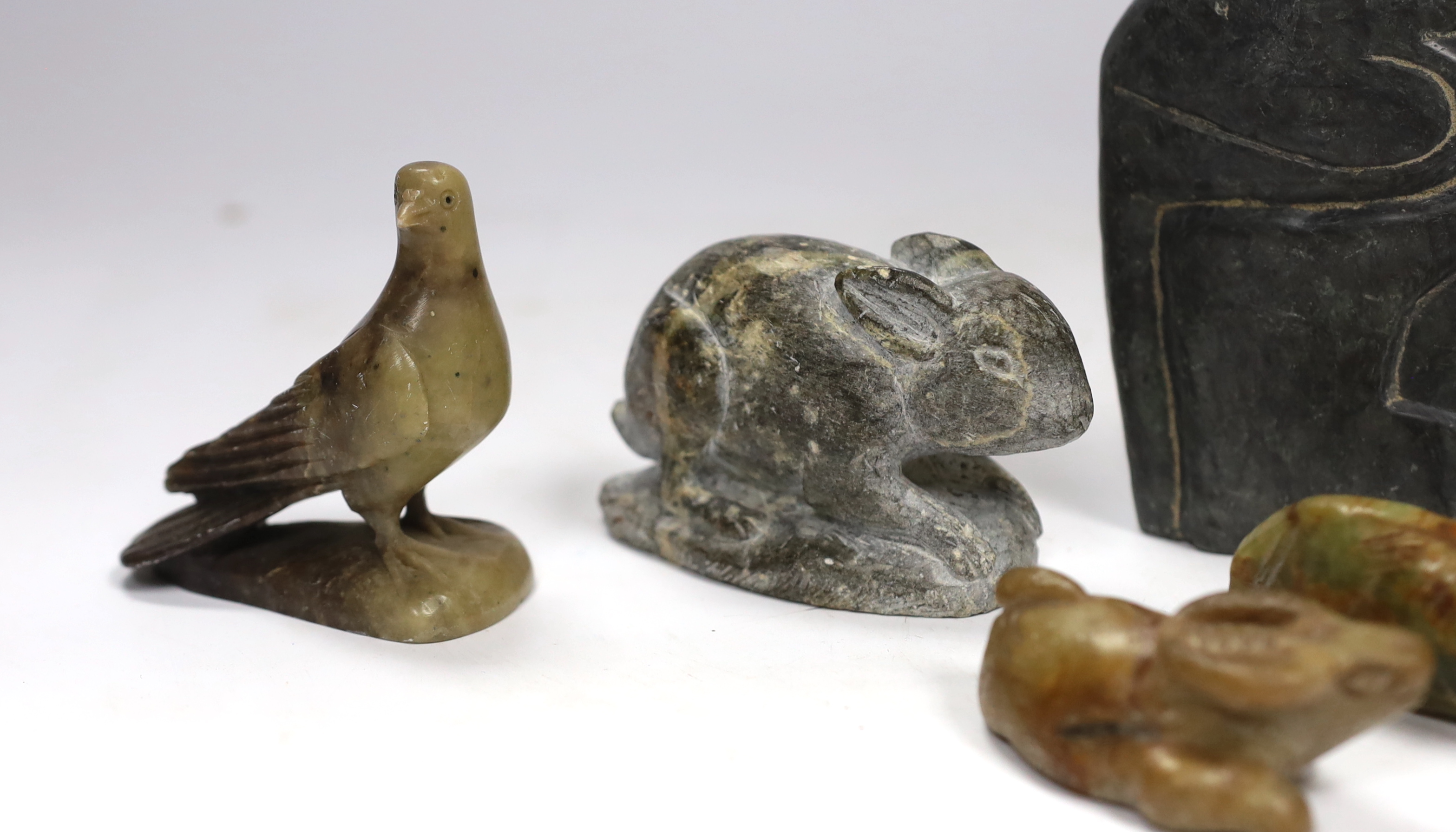 Ten hardstone carvings including Inuit examples, largest 14cm high